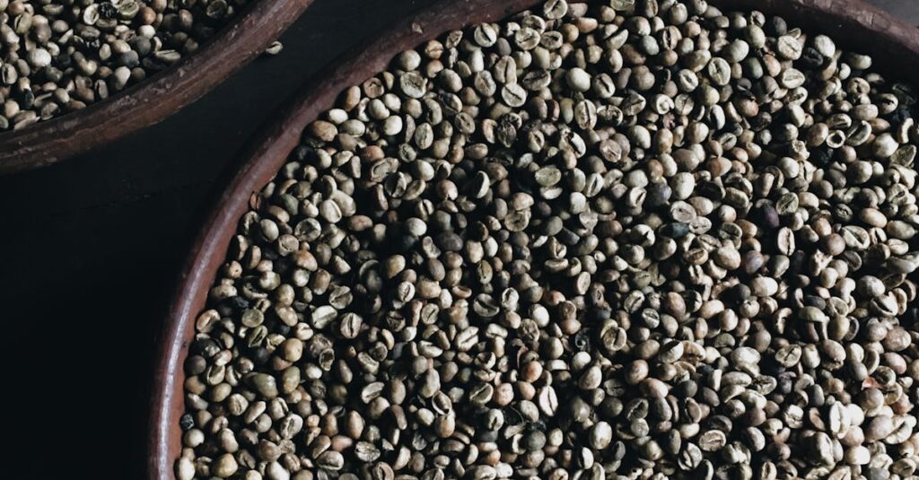 Close-up of raw coffee beans in wooden bowls, highlighting texture and natural aroma.